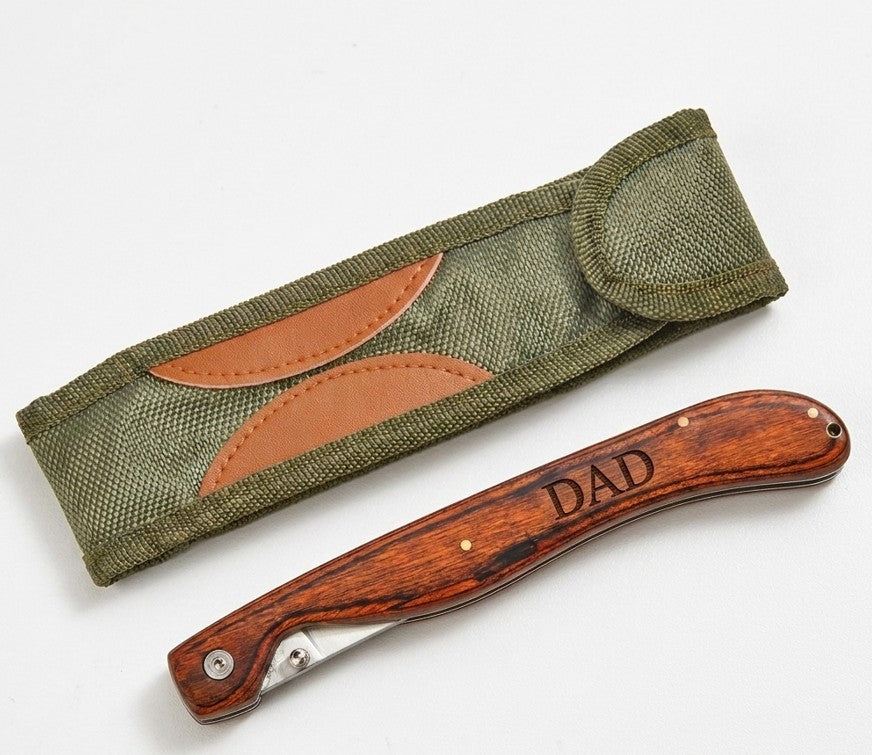 Stainless steel fillet knife with birchwood handle, locking blade, and nylon carrying pouch, designed for filleting fish and trimming meats, making a thoughtful gift for fishing enthusiasts and outdoor adventurers.