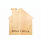 House-shaped pine wood board, 13 x 14 inches, with a smooth surface for cutting, serving, and personalized engraving, ideal for housewarming gifts.
