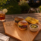 Pine wood baseball home plate board measuring approximately 17 x 17 inches, featuring a home plate shape with a baseball and bats design, perfect for serving snacks or preparing food at sports-themed gatherings.