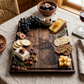 Deer Hunting Wood Board, 18 inches x 14 inches, made of dark wood with a detailed engraved deer design. A rustic serving board for snacks, cheeses, and charcuterie, ideal for hunting and outdoor enthusiasts.
