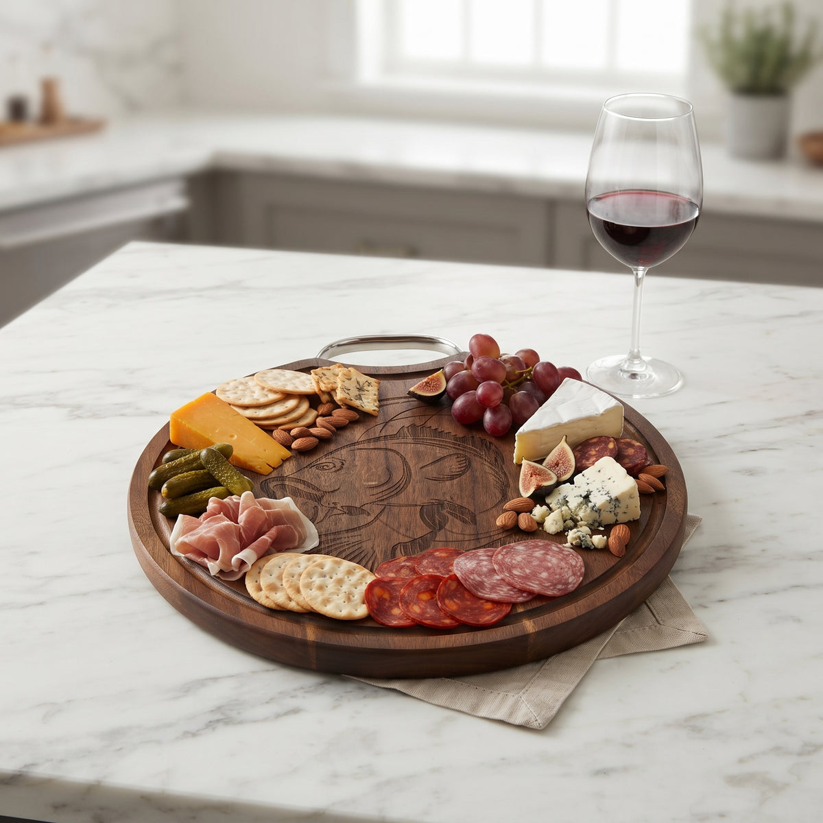 Round Fishing Wood Board, 13 inches diameter, made of dark wood with detailed bass, fishing rod, and hook designs. Features a sturdy silver handle and serves as a cutting or serving board for fishing enthusiasts.

