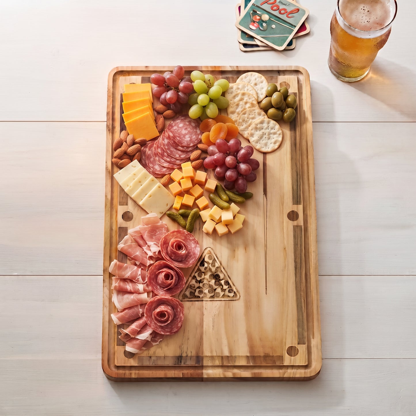 Pool table-shaped wood serving board, 18 x 11 inches, made from pine wood with detailed pool cues, balls, and rack, ideal for snacks and appetizers.
