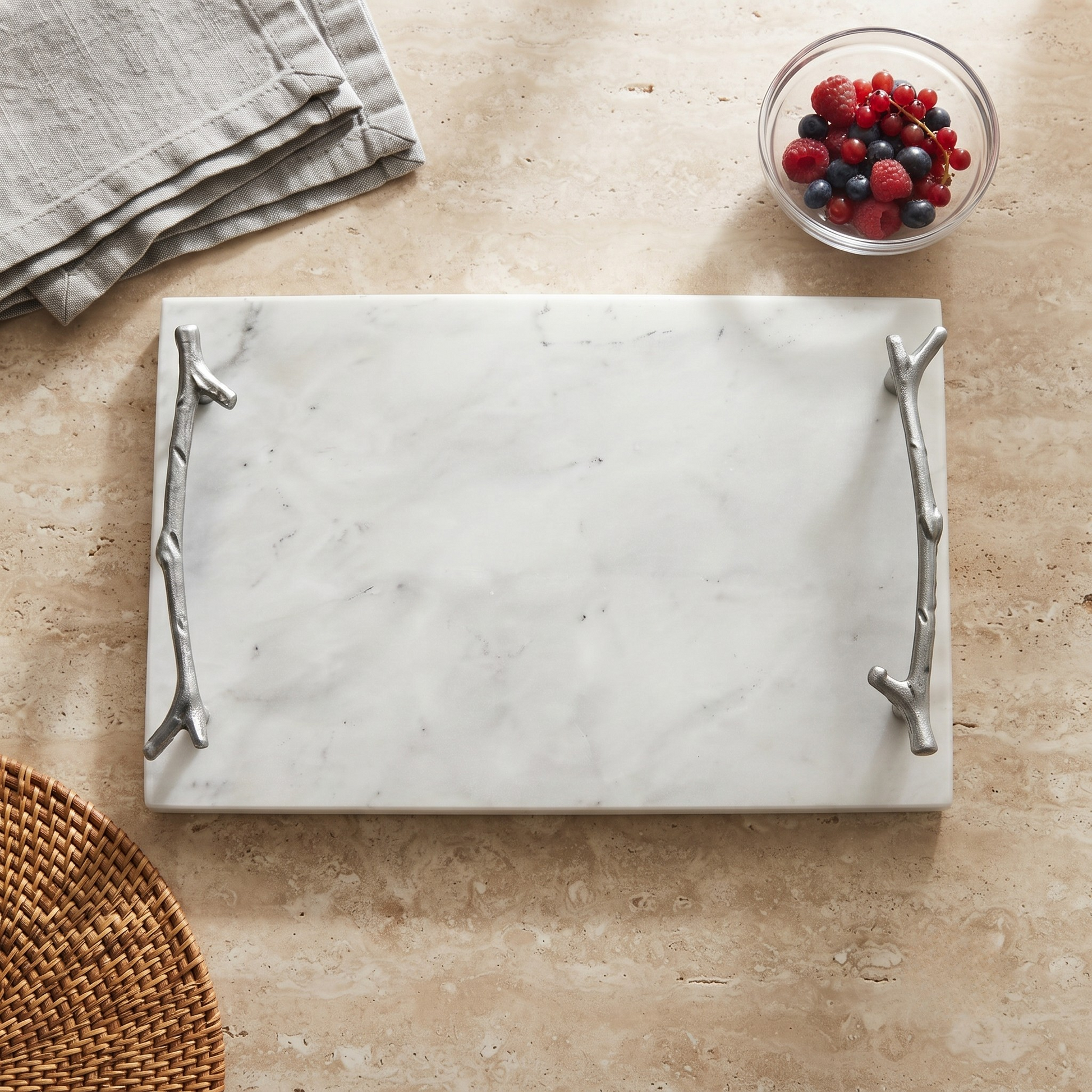 White marble serving board with silver branch handles, 8-inch by 12-inch, ideal for serving cheese, fruit, and appetizers.