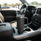 Grey 40 oz stainless steel tumbler with handle and straw, featuring an insulated design for keeping drinks hot or cold on the go.
