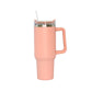 Peach 40 oz stainless steel tumbler with handle and straw, featuring an insulated design for keeping drinks hot or cold on the go.
