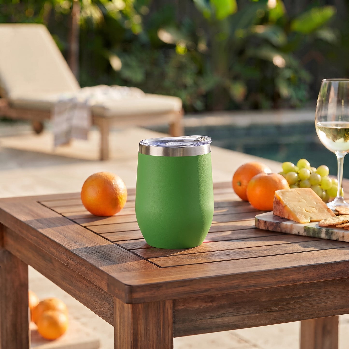 Green 12 oz stainless steel stemless wine tumbler with a compact design for keeping wine or other drinks hot or cold on the go.

