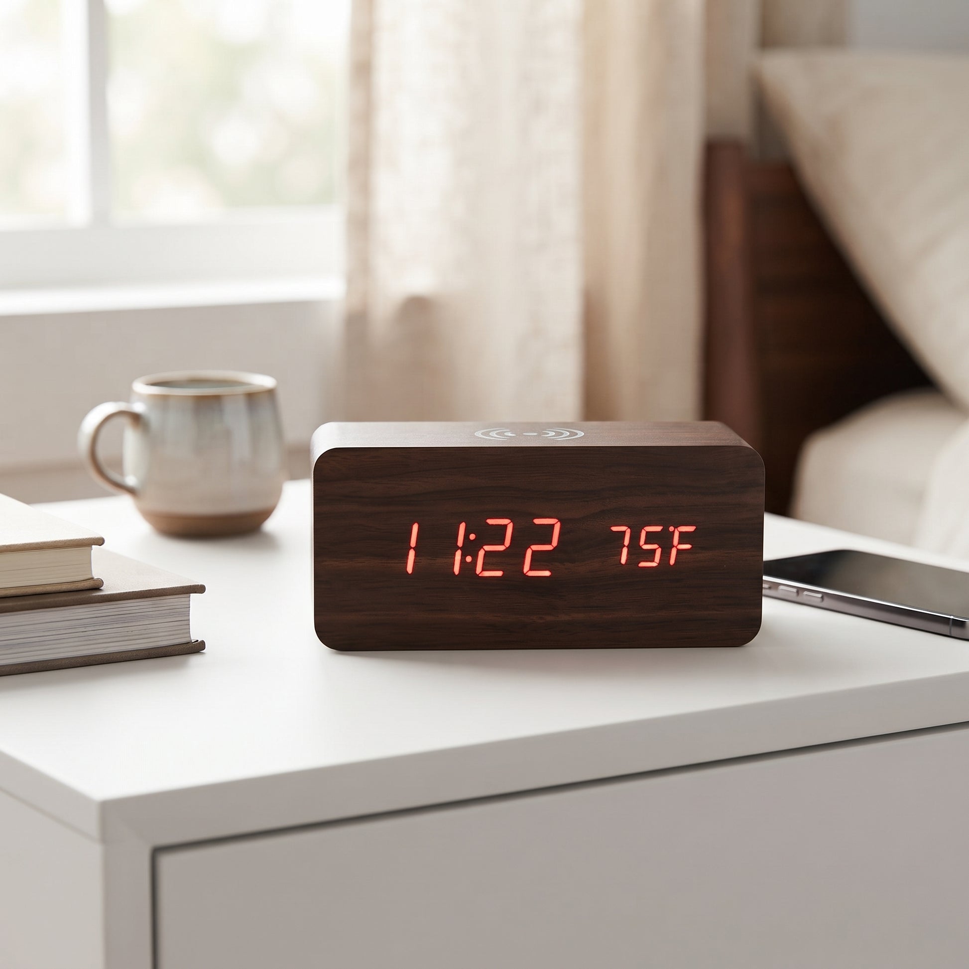 Walnut wireless phone charger and digital alarm clock with LED time, date, and temperature display, bamboo wood design, and up to three alarms.
