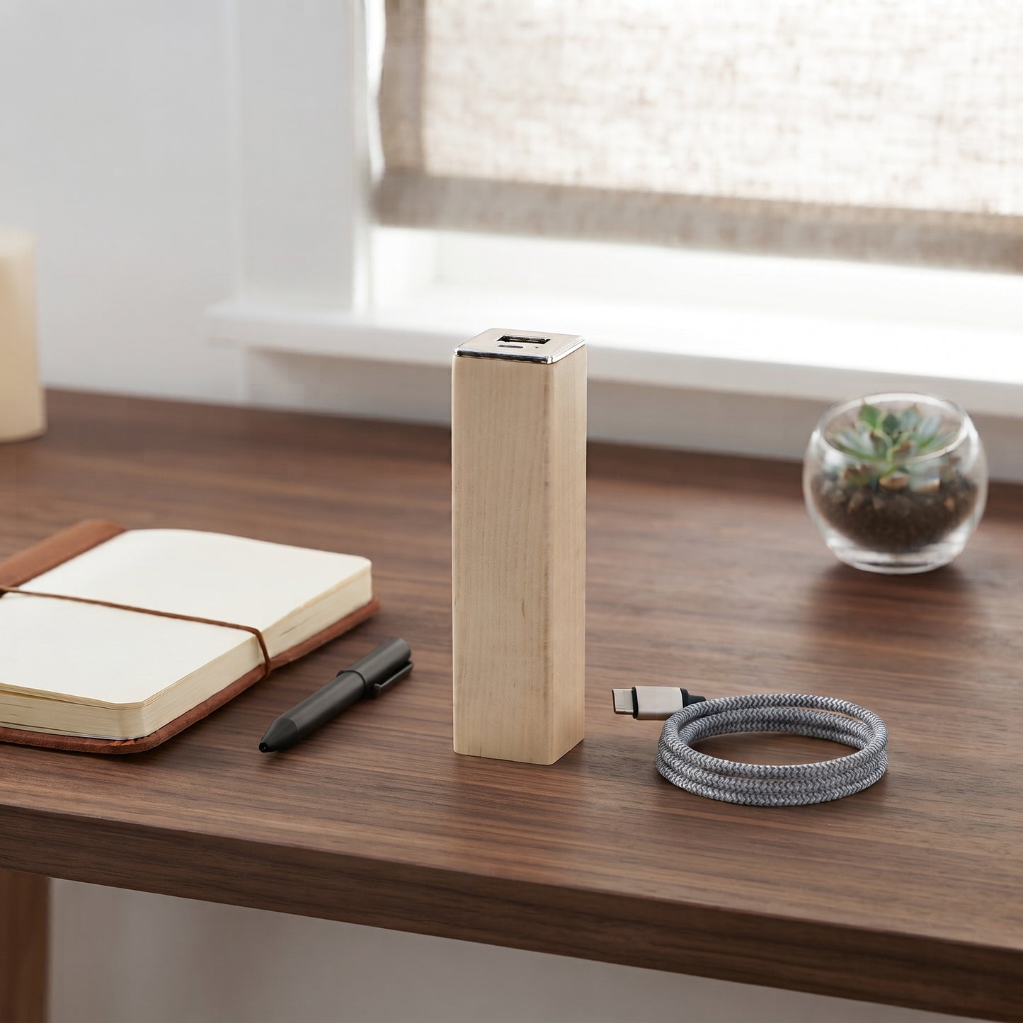 Square tube maple wood power bank charger, 2200 mAh, with a compact 4-inch design for portable charging of smartphones and other devices.
