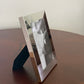 Manchester 4 inch x 6 inch photo frame with a bright metal finish and timeless design, perfect for displaying cherished photos and can be personalized for a special touch.