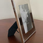 London 5 inch x 7 inch  photo frame featuring a bright metal finish and classic beaded edge, perfect for displaying treasured photos with timeless elegance.