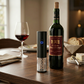 Black rechargeable wine opener with a brushed aluminum finish, stainless steel corkscrew, foil cutter, and USB charging cord, making it a sophisticated Father's Day gift for wine lovers.