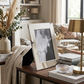 Manchester 8 inch x 10 inch photo frame with a bright metal finish and classic design, perfect for displaying cherished memories in either portrait or landscape orientation.