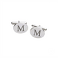 Palladium-finish oval cuff links with a non-tarnishing polished surface, measuring 0.75" x 0.875" each. The engravable cuff links are presented in an elegant black gift box, ideal for personalized gifting and formal occasions.