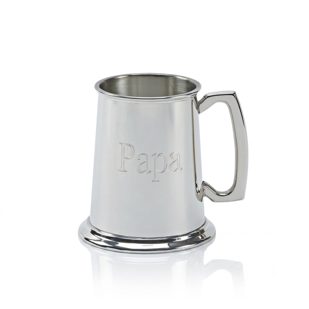 Personalized 16 oz pewter tankard with a bright polished non-tarnish finish, glass bottom, and classic handle. Made in England and gift boxed, making a great Father's Day gift.