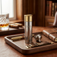 Personalized shotgun shell flask with stainless steel construction and gold-tone cap, a unique Father's Day gift for hunters, anglers, and outdoor-loving dads.
