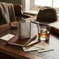 8 oz polished stainless steel flask with a sleek, non-tarnish finish and hinged cap design, a stylish and practical Father’s Day gift for carrying beverages on the go.