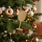 Brass wine glass Christmas ornament with a bright non-tarnish finish, flat engraving surface on both sides, and silver hanging string. Measures 3.375 inch x 1.5 inch and comes boxed for gifting or keepsake display.