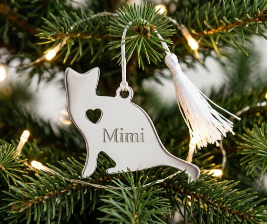 Cat ornament with heart design and white tassel, 2.5 x 3.4 inches, personalized pet holiday keepsake in a white box.