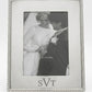 London 5 inch x 7 inch  photo frame featuring a bright metal finish and classic beaded edge, perfect for displaying treasured photos with timeless elegance.