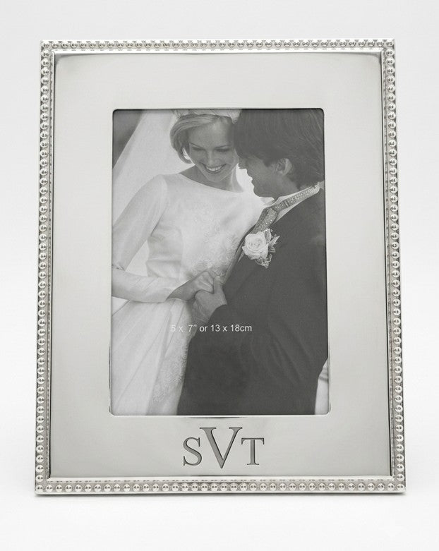 London 5 inch x 7 inch  photo frame featuring a bright metal finish and classic beaded edge, perfect for displaying treasured photos with timeless elegance.